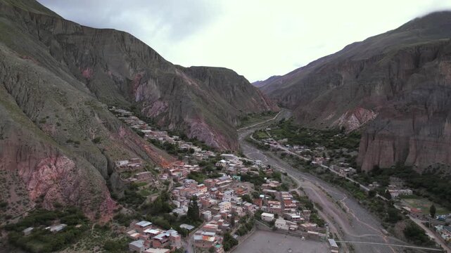 4K drone aerial view of Iruya, Salta, Argentina. A remote Andean village surrounded by dramatic mountains, deep valleys and winding roads in one of the most spectacular landscapes of northern Argentin