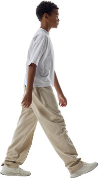 Boy walking right in side view isolated on transparent background. Concept of mobility communication, school project graphics, animated motion sequences.