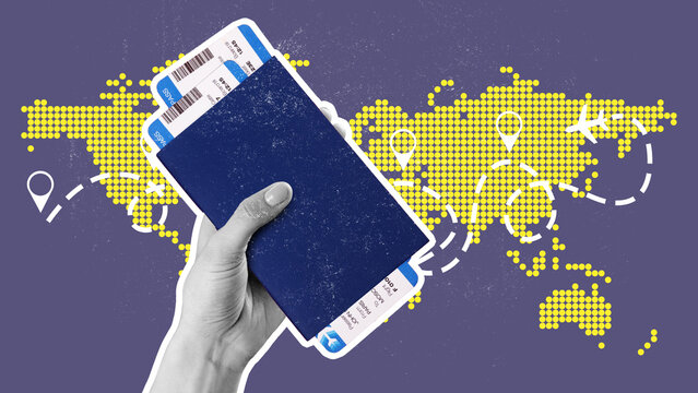 Planning a trip with travel tickets and a passport in hand while looking at a world map