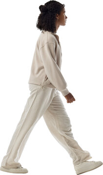 Teenage girl walking right in profile isolated on transparent background. Concept of sustainable mobility, casualwear promotion, urban planning visualization.