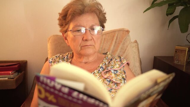 senior woman reading book