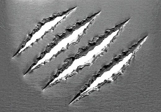 Monster beast claw marks ripped through metallic steel surface