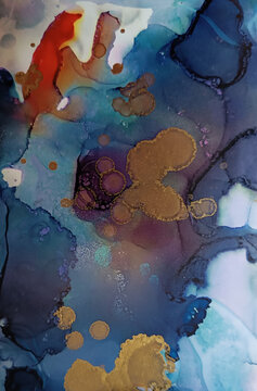 Abstract fluid art pattern in blue tones with scarlet and golden spots