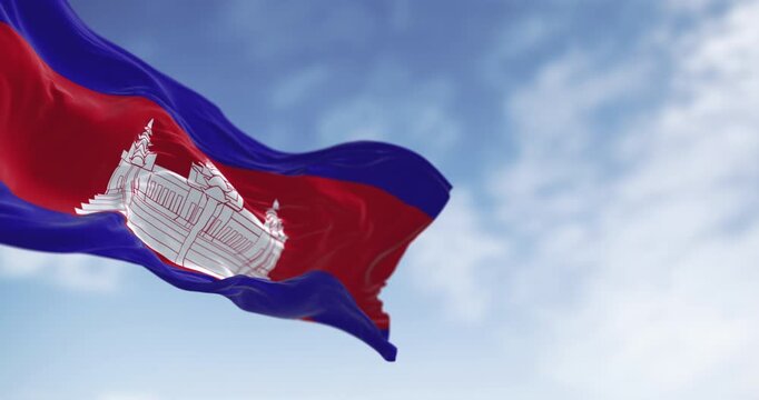 Cambodia national flag waving. Three bands, blue, double red, blue, with Angkor Wat in white centered on the red. 3d illustration render. Fluttering fabric. Selective focus
