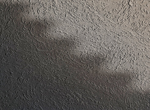 Dramatic shadow from the wobbly roof slate on the street wall