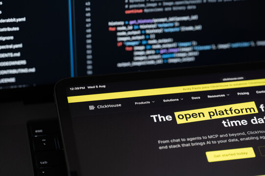 ClickHouse Ai company web page on program code background
