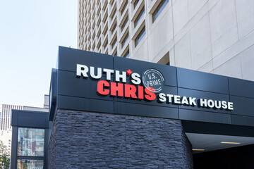 Fototapeta premium Toronto, Ontario, Canada - August 5, 2026: Ruth's Chris Steak House restaurant sign on the building in downtown Toronto, Ontario, Canada. 