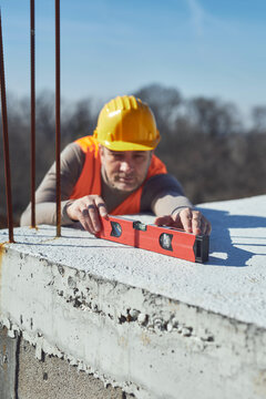 Construction worker working outdoors on a construction site.