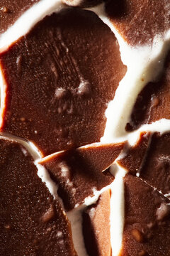 Macro Close-Up of Cracked Chocolate Ice Cream Shell