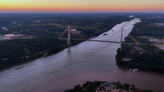 Pulling Back from the Paran&aacute; River and Tancredo Neves Bridge at Dusk