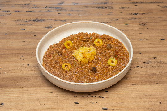 Cuban Picadillo Habanera with Ground Beef, Olives, Raisins, and Fried Plantain Bits