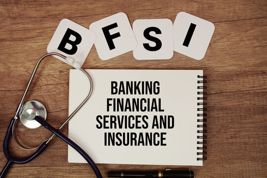 BFSI Banking Financial Services and Insurance text written on notepad with stethoscope on wooden background
