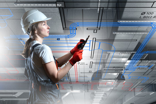 Engineering design: female engineer reviews building plans and HVAC systems using tablet with technical blueprint overlay.