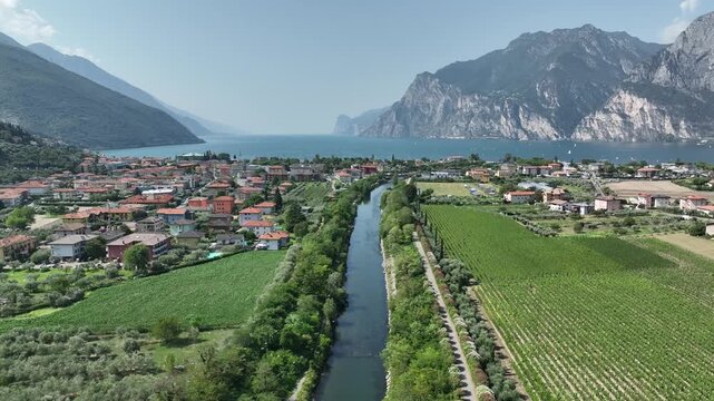 Exploring small towns around Lake Garda in Italy with views of mountains and greenery
