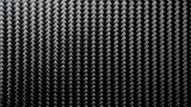A close-up image of a black carbon fiber weave pattern.