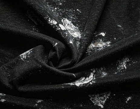 background featuring grunge ink splatters, rough scratches, halftone dots, and aged speckled patterns. This gritty retro design element creates a bold urban look, perfect for modern graphic design pro