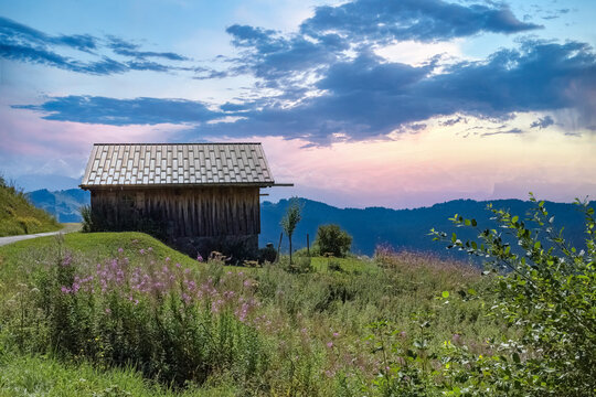 Le mont Caly in France, a chalet in the pasture, typical landscape in summer, Haute-Savoie
