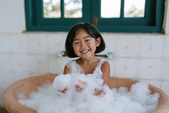 Joyful girl in bubble filled bathtub for family bath time background and cheerful banner design