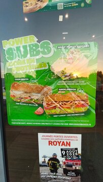Royan, France - August 06, 2026: Charente-Maritime. Nouvelle-Aquitaine. Power Subs menu display featuring various sandwich options including Thon Mozza and Dinde Jambon in a restaurant setting