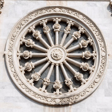 Synthwave Marble Christianity. Ancient Marble Rose Window (Wheel Of Fortune) From San Zeno Basilica, 11Th Century, Verona, Italy