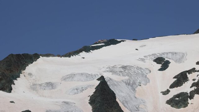View of St&uuml;dlh&uuml;tte below Gro&szlig;glockner, the highest mountain hut in Austria, Austrian Alps