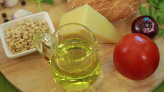 Mediterranean sandwich ingredients arranged on a wooden cutting board in a kitchen