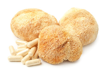 Functional mushrooms and pills isolated on white © New Africa