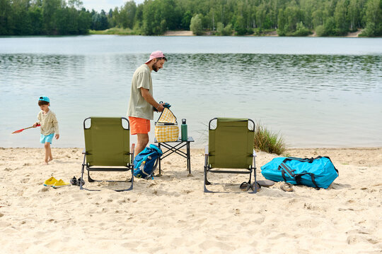 Father and Son Enjoying a Relaxing Day at the Lake