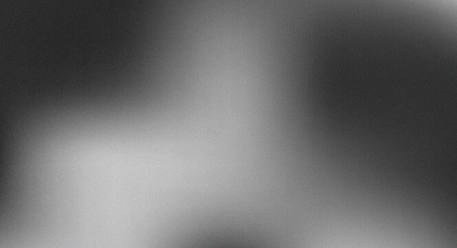 Monochrome metallic gradient background with soft silver glow and dark graphite texture