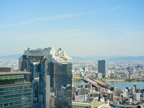 City Skyline Shows Umeda Sky Building and River in Osaka 