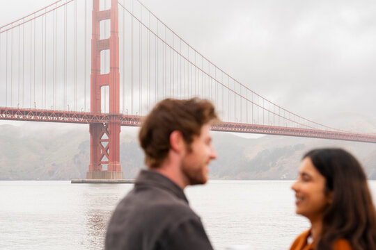 candid couple portrait together golden gate bridge san francisco 