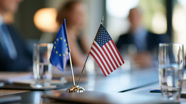 two miniature banners standing on a bright bilateral meeting desk implying diplomacy and summit protocol, cooperation and lasting agreement concept, negotiation, international