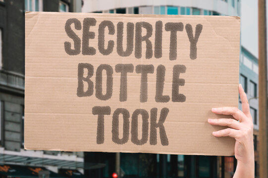 "Security Bottle Took" A purchased drink was confiscated at the screening point. SECURITY. CONFISCATE. BOTTLE. SCREENING. AIRPORT.
