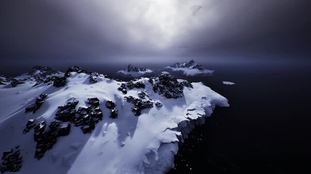 snowy rocky outcrop under stormy sky, dark ocean below and jagged black stones piercing white snow, heavy clouds casting long shadows and cold blue light,