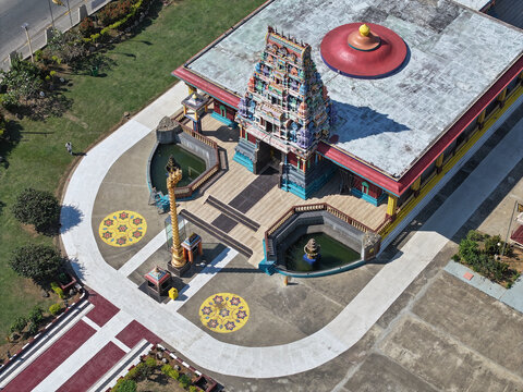Aerial view of Sri Siva Subramaniya Swami Temple featuring its vibrant, ornate gopuram, traditional architecture, and surrounding grounds in Nadi, Western Division, Fiji.