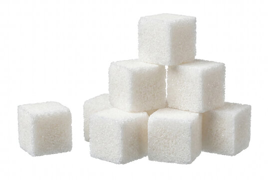 Stacked White Refined Sugar Cubes with Single Cube Aside