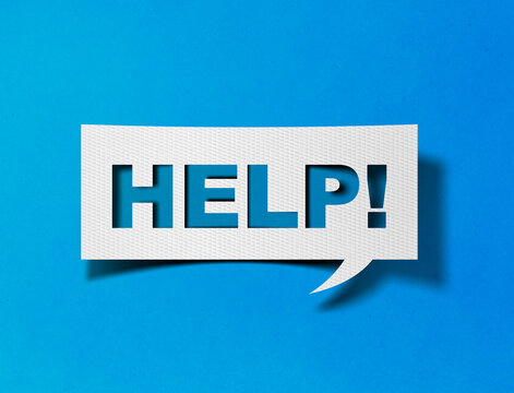 Help speech bubble on blue background with paper cutout design
