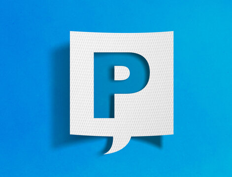Letter P speech bubble on blue background with paper cutout design