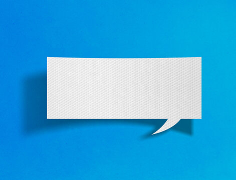 Blank horizontal speech bubble on blue background with paper cutout design