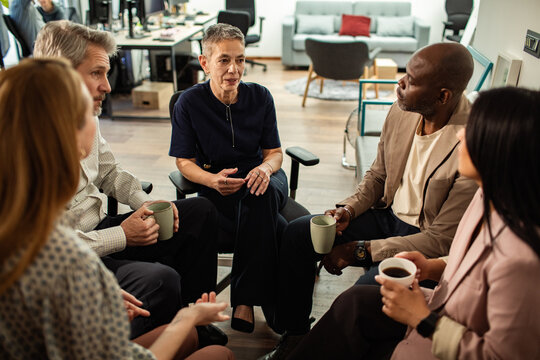 Business team having a casual discussion in modern office