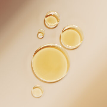 High-quality close-up of golden liquid oil drops isolated on white, face serum cosmetic beauty product design elements