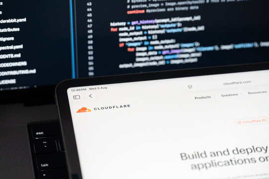 Cloudflare Ai company web page on program code background