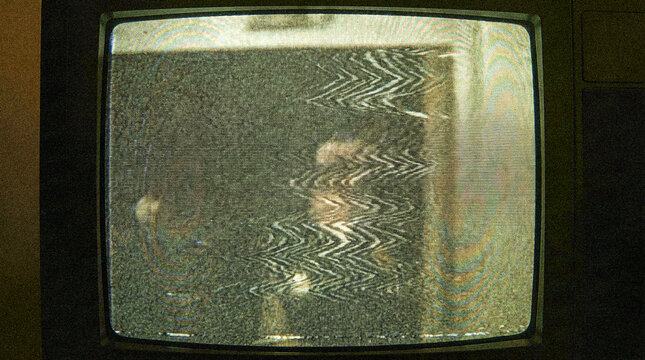Vintage television screen with heavy signal noise