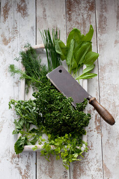 Ingredients of Frankfurt green sauce and cleaver