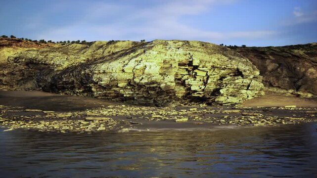 wind swept cliff grass tufts resilient coastline under clear sky, conservationist mapping dune vegetation and erosion patterns along steep slope