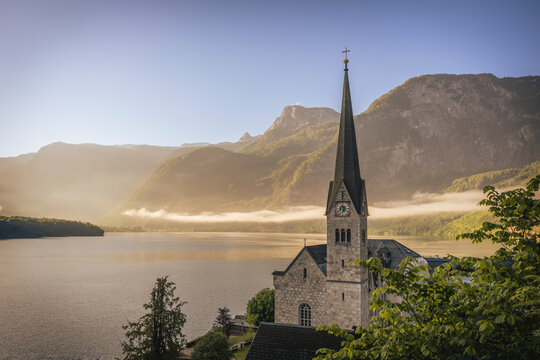 Pfarrkirche Hallstatt church by the lake in Austria at sunrise