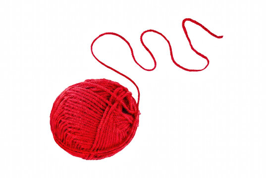 Single red wool yarn ball with wavy loose strand