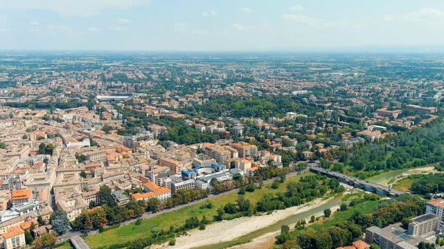 Parma, Italy. The historical center of Parma. Cittadella Park - Public park on the site of a pentagonal fortress from the 16th century. Panorama of the city from the air. Summer day. Drone footage