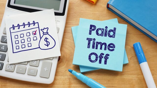 Paid time off note with calendar and money bag on calculator