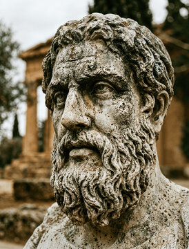 Classical Marble Sculpture Fragment of Bearded Male with Temple Columns in Background